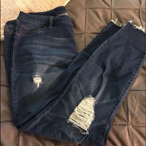Distressed jegging dark wash